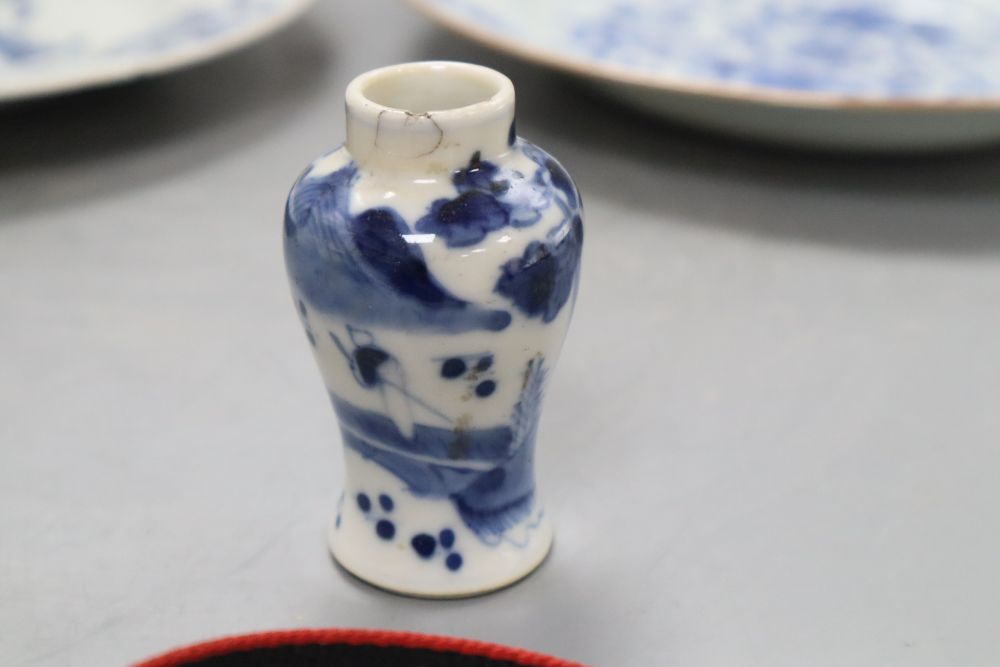 Two Chinese blue and white export plates, a blue and white miniature vase, a dish and bowl